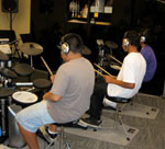 Liberty School students drumming at Recreational Music Center