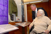 Sybil Stockdale examining the Stockdale Exhibit